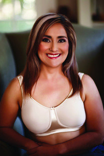 Image of woman wearing cappucinno colored  mastectomy bra